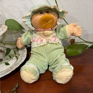 Adorable cabbage patch Green Baby Doll with Pacifier